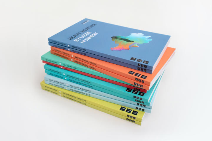 stack of colourful books