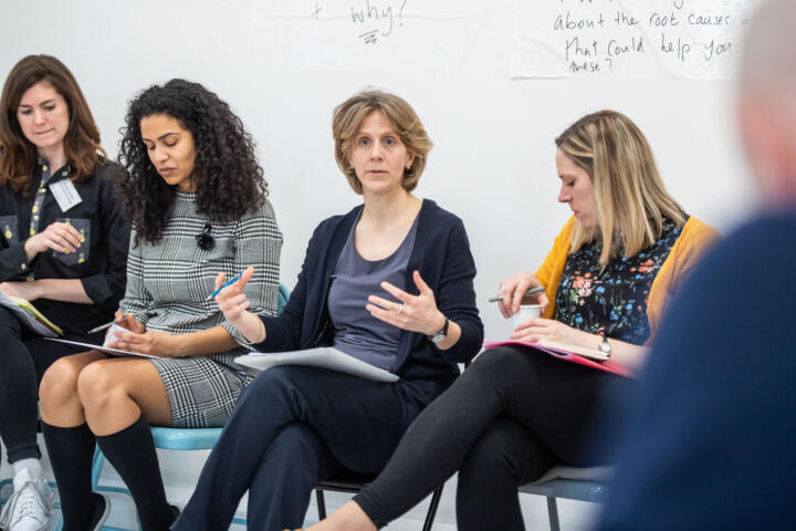workshop participants in a group discussion