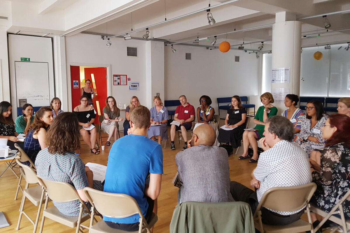 workshop participants sitting in a circle